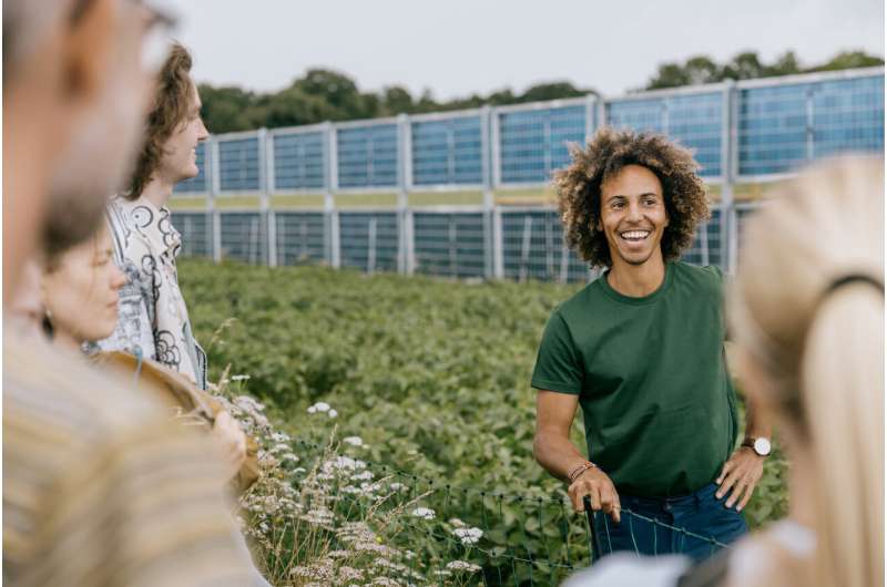 Ph.D. Student Kamau Lindhardt at the Aarhus University agrivoltaic field. Credit: Aarhus University, AU Photo Double harvest: Vertical solar panels and crops thrive side by side